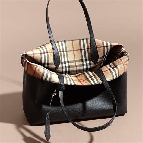 burberry reversible bucket bag|Burberry medium top handle tote.